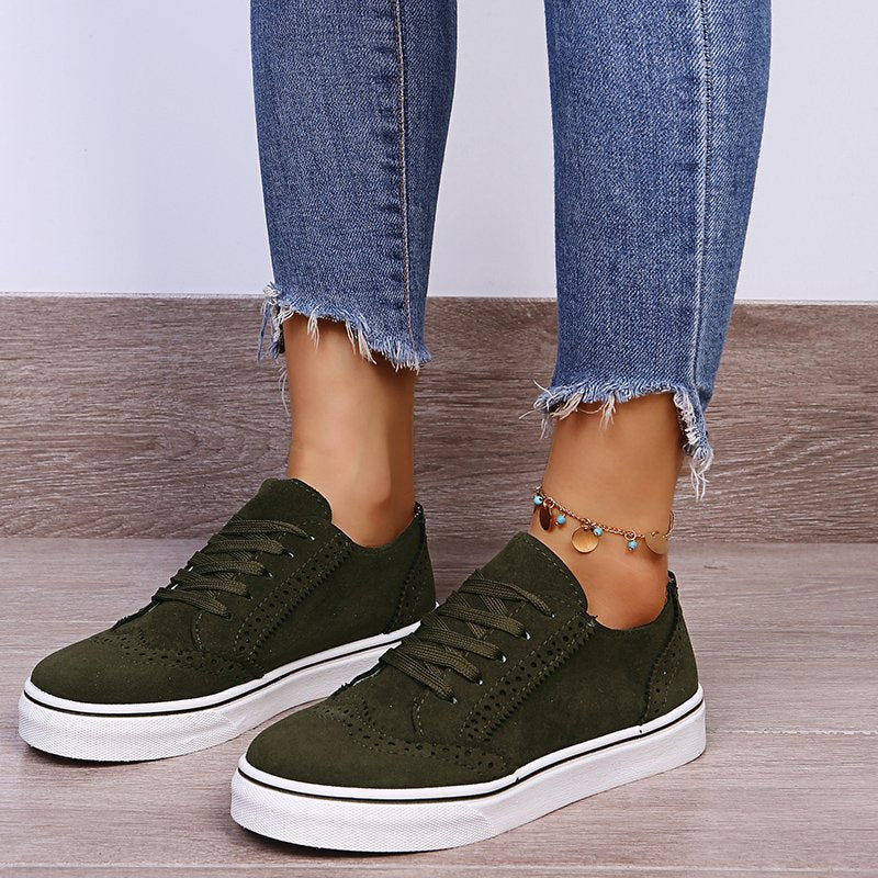 Elegantes zapatillas planas con cordones