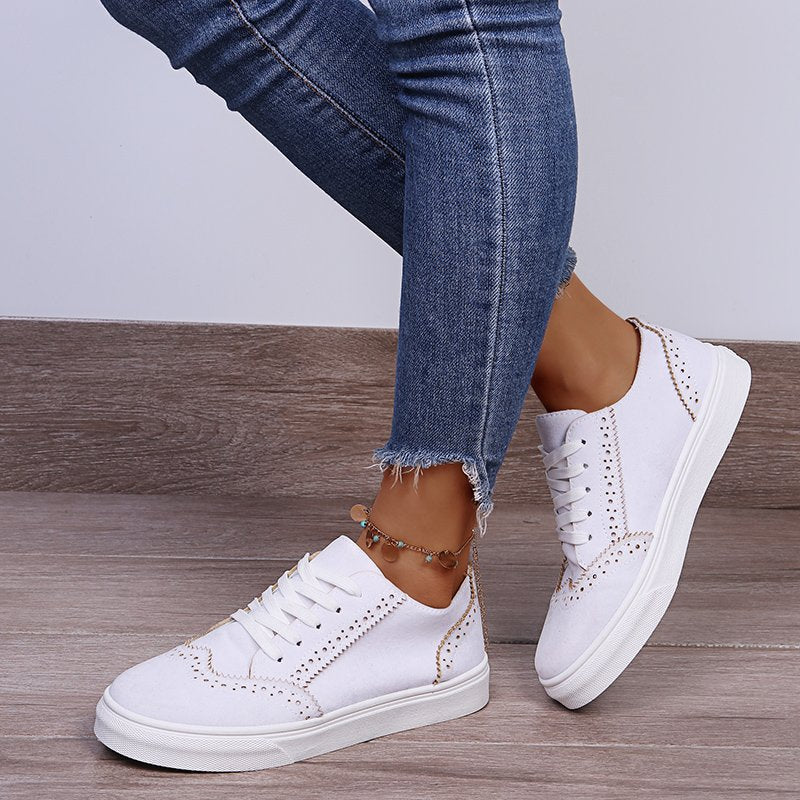 Elegantes zapatillas planas con cordones