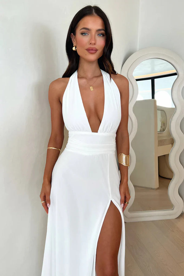 Vestido largo elegante con espalda descubierta y abertura lateral