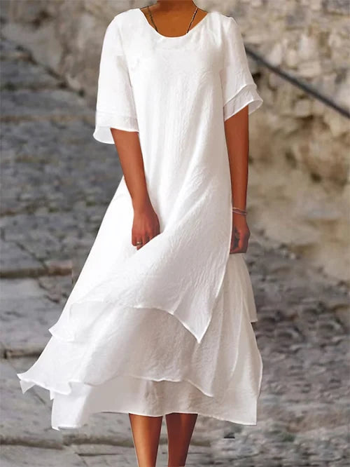 Vestido largo ligero con mangas cortas y falda de capas
