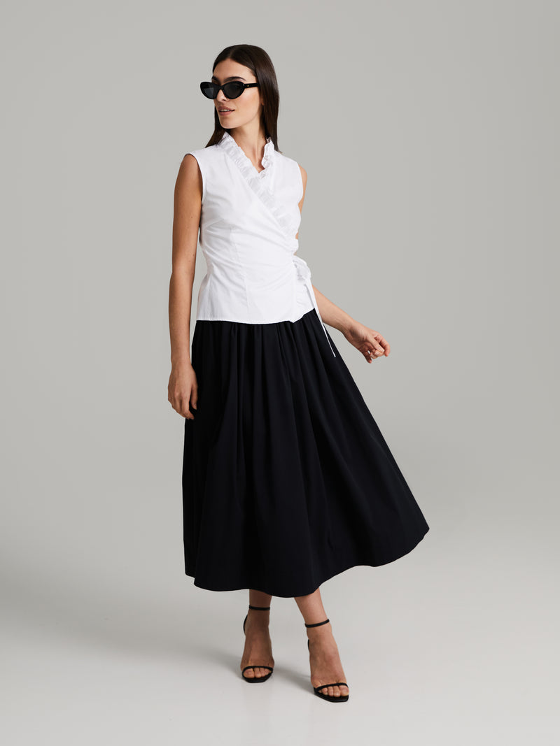 Falda midi amplia con estilo actual para un mira versátil
