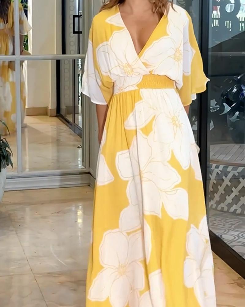Vestido maxi floral con mangas murciélago